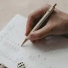 Rosa kuglepen med hjerte i æske